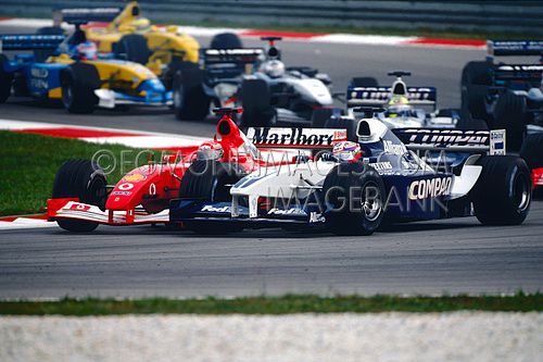 Montoya-Schumacher crash, GP Malaysia 2002-1.jpg