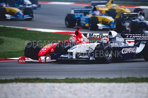 Montoya-Schumacher crash, GP Malaysia 2002-2.jpg